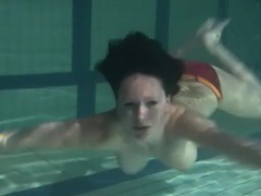 LibertyPorno presents: Bikini stripped from girl in the pool