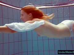 LibertyPorno presents: Redhead in a white dress and sexy bikini