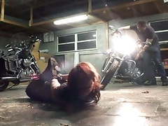 LibertyPorno presents: Biker girl hogtied in the garage