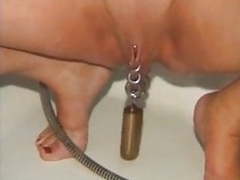 LibertyPorno presents: Pierced nipples and pussy mature slave in bdsm action