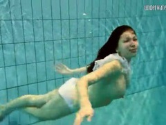 LibertyPorno presents: Girl in white panties swims in pool