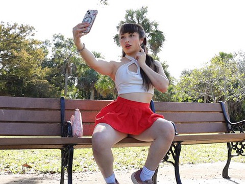 LibertyPorno presents: Gorgeous solo college babe doing striptease in a park - pixie