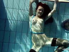 LibertyPorno presents: In black stockings pretty girl goes for a swim