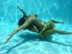 LibertyPorno presents: Lesbian sex underwater looks amazing