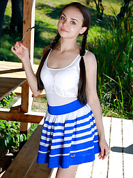 LibertyPorno presents: Fresh-Faced russian beauty Mia Grandy gets totally naked on a picnic table in a garden